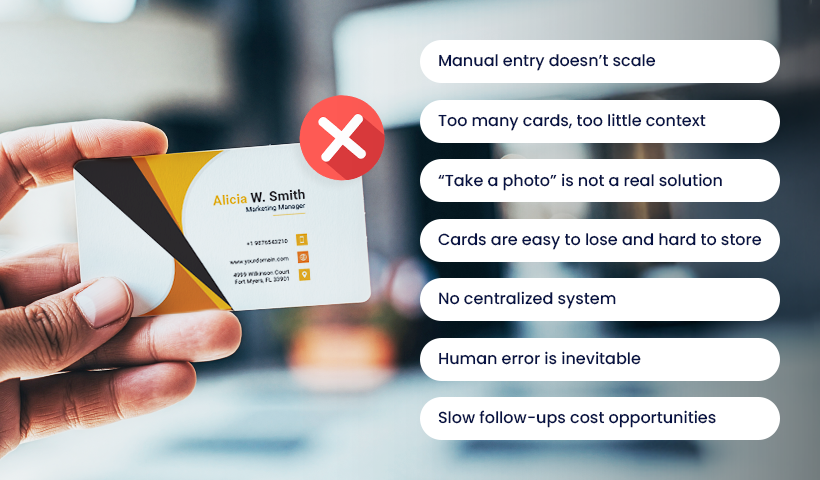 Hand holding business card with list of networking challenges